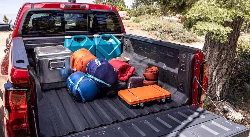 The bed of a 2024 Chevy Colorado Trail Boss is shown after leaving a dealer that has trucks for sale.