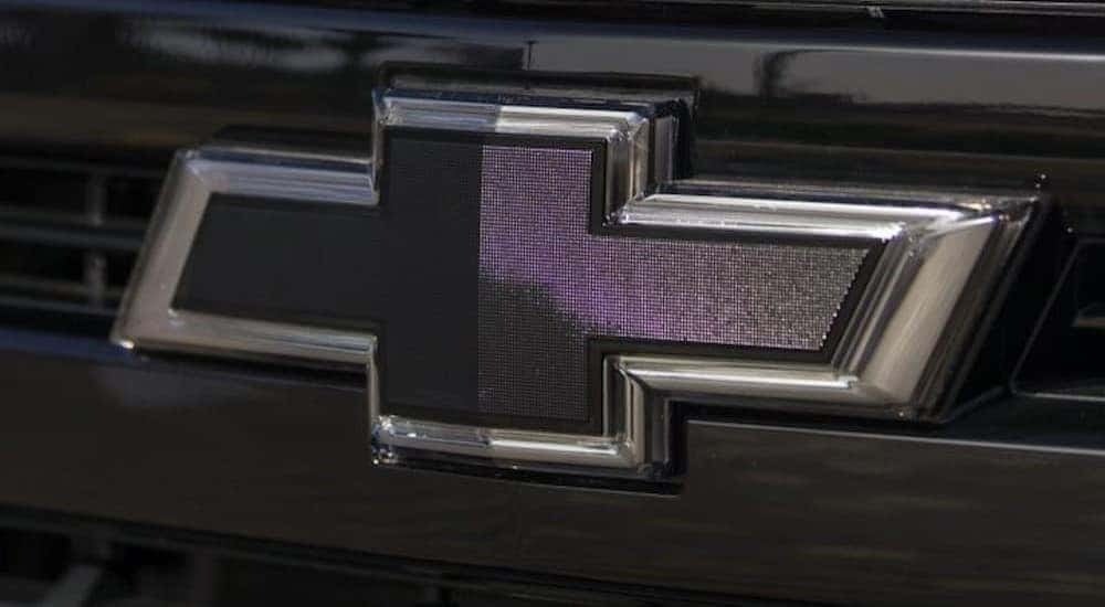 A black and chrome Chevy badge is shown.
