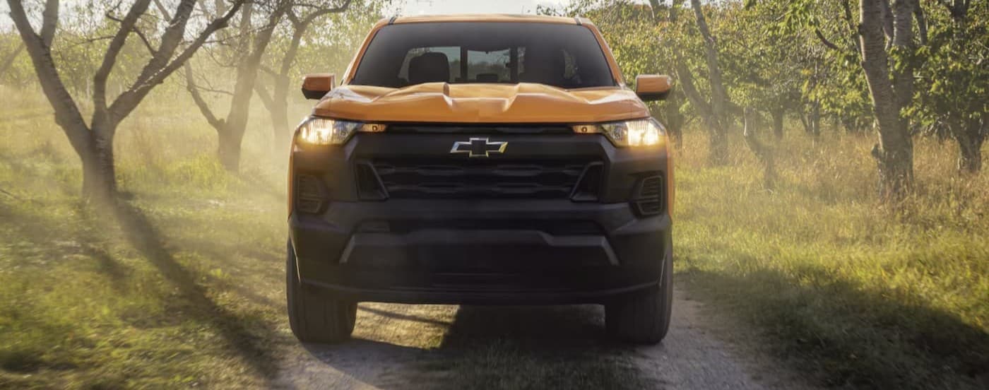 A yellow 2026 Chevy Colorado parked offroad.