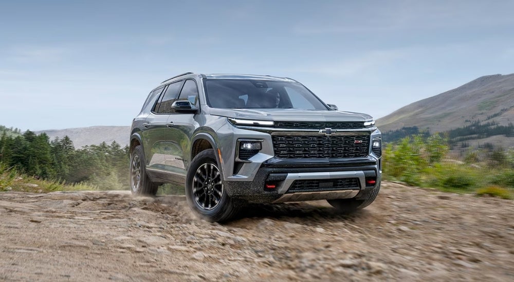 Silver 2026 Chevy Traverse Z71 driving off-road