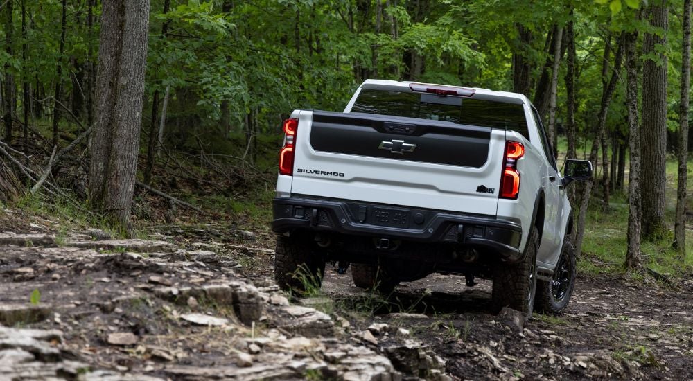 White 2026 Chevy Silverado 1500 ZR2 driving off road