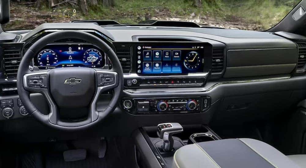 The dashboard and front seats of a 2023 Chevy Silverado 1500.