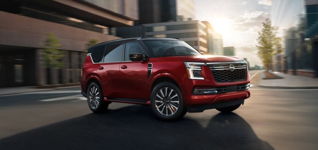 Red Nissan Armada on road