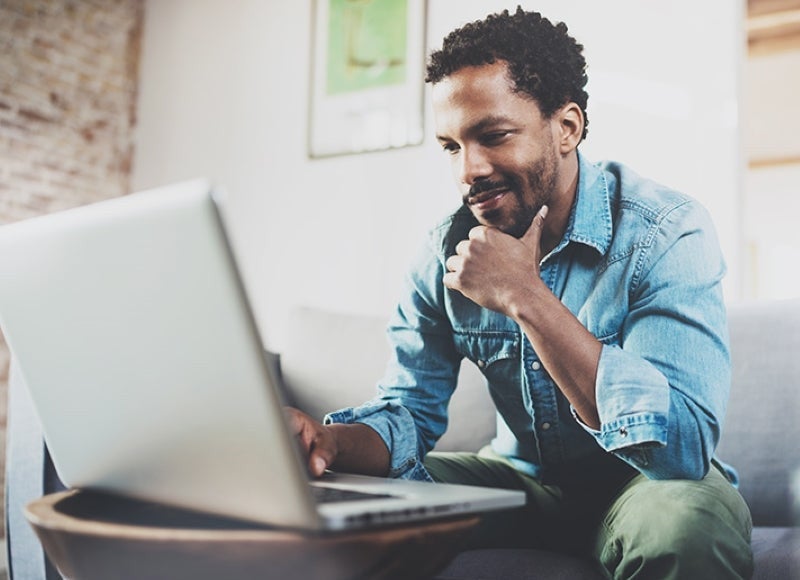man using a laptop