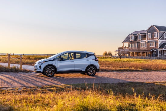 a Chevy Bolt EUV in white parked on the coast