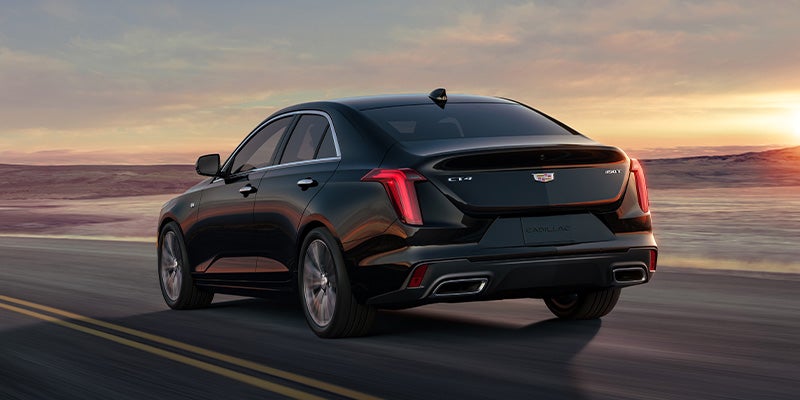 rearview of a Cadillac CT4 driving 