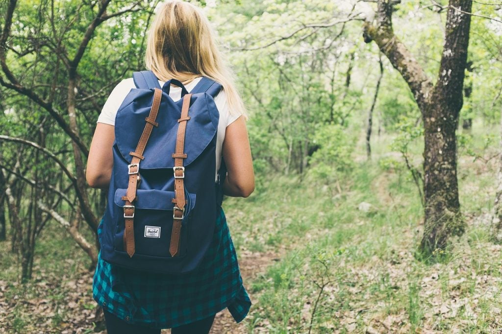 A woman hiking.