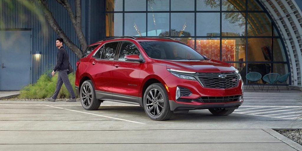 Red 2022 Chevrolet Equniox parked on display.
