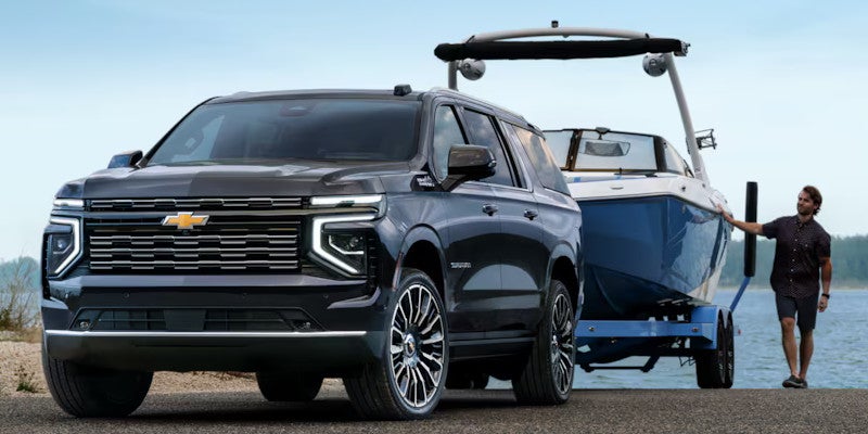 2025 Chevy Suburban towing a Boat