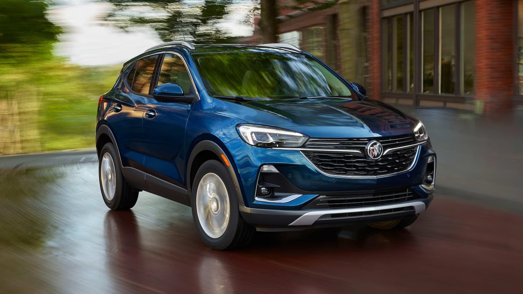 A 2023 Buick Encore GX in blue at a 3/4 turn.