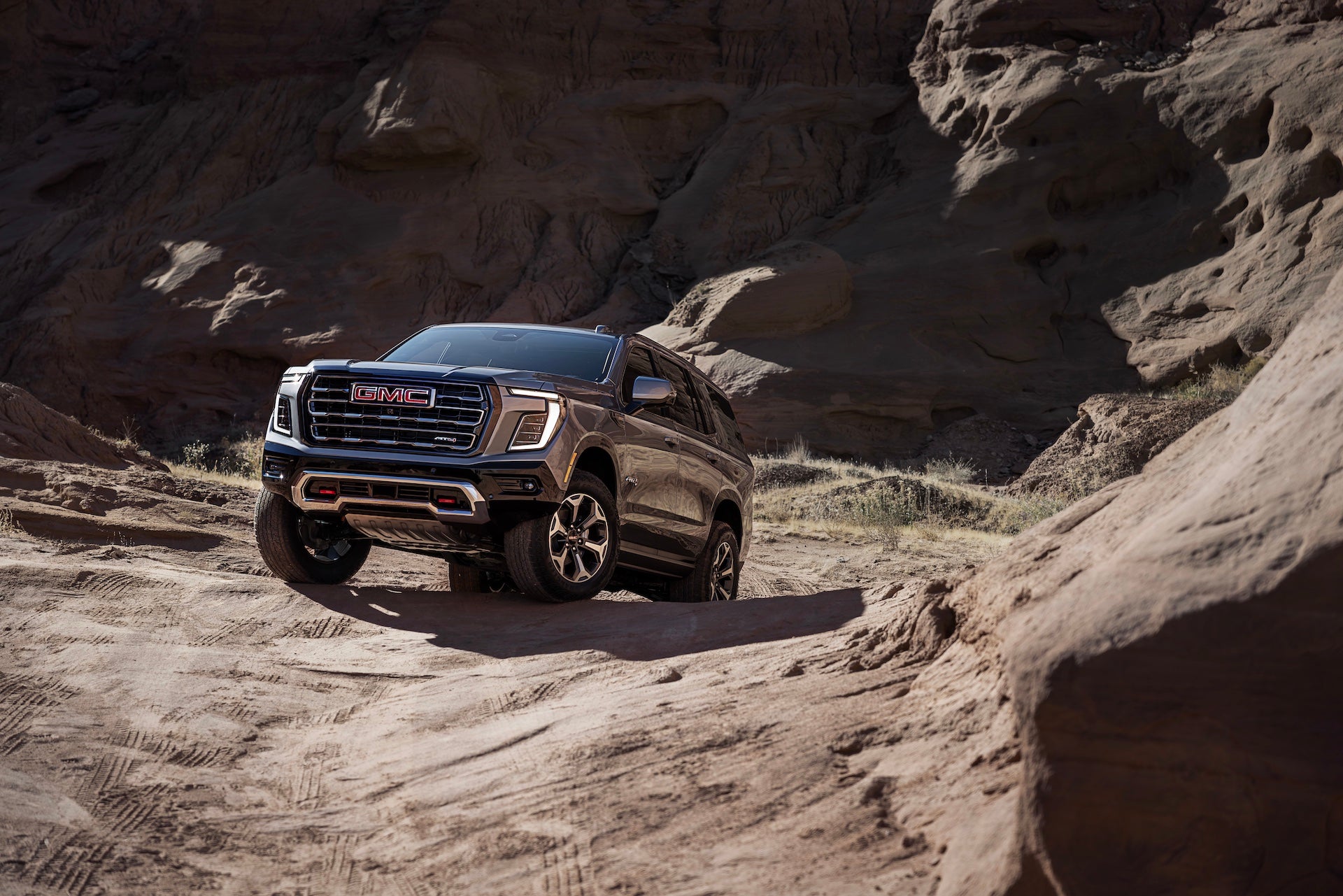 Front 3/4 view of the 2025 GMC Yukon AT4 Ultimate.