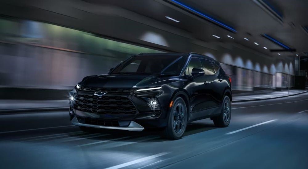 Black 2024 Chevy Blazer driving through a tunnel