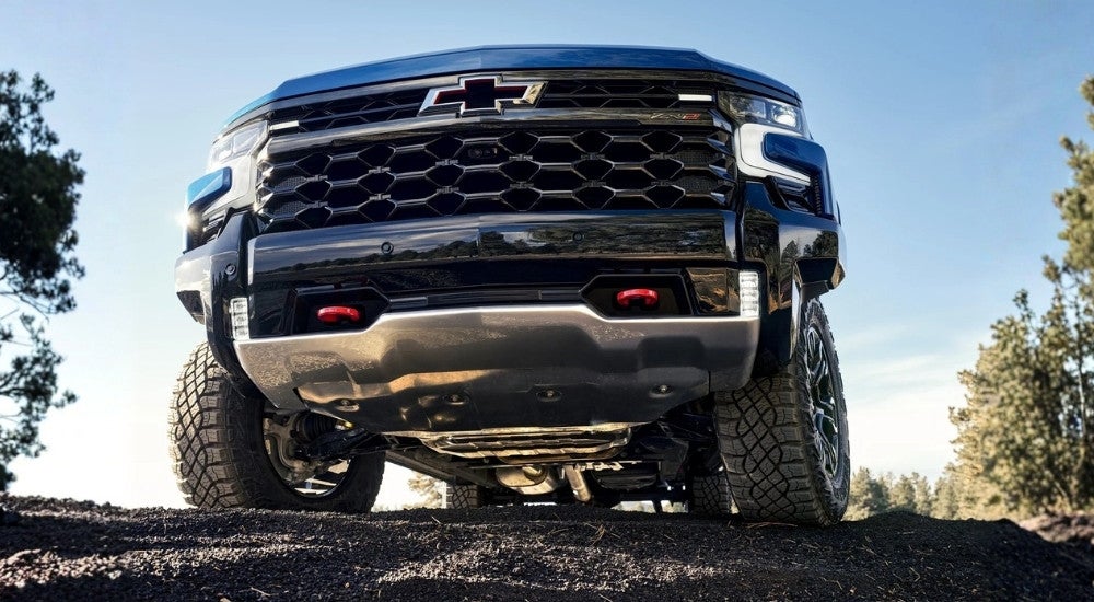 Blue 2025 Chevy Silverado 1500 ZR2 parked off-road