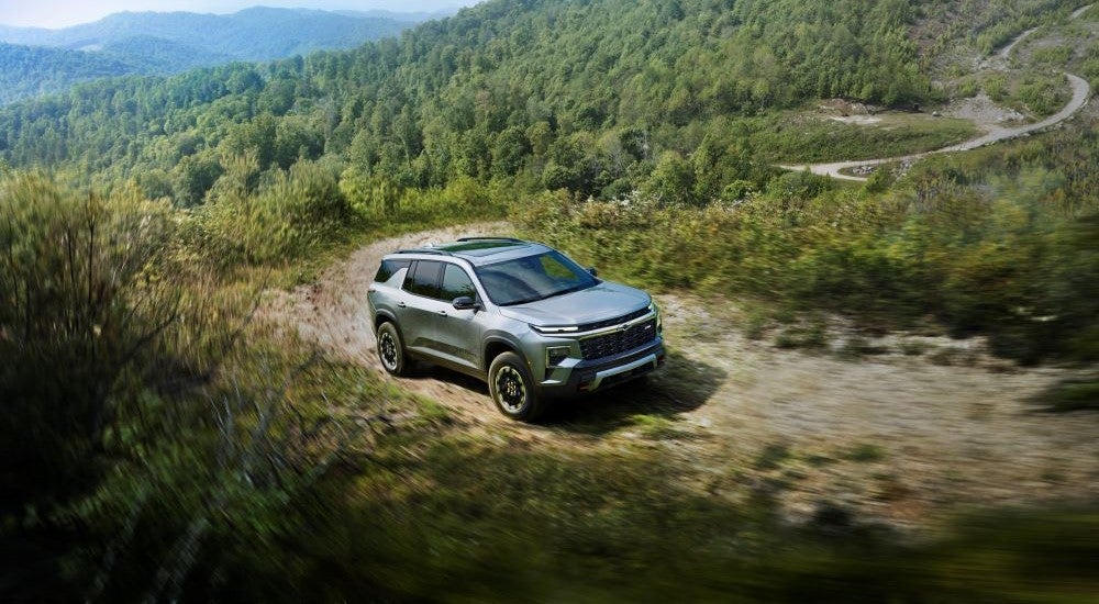 2025 Chevy Traverse Z71 driving on a mountain path