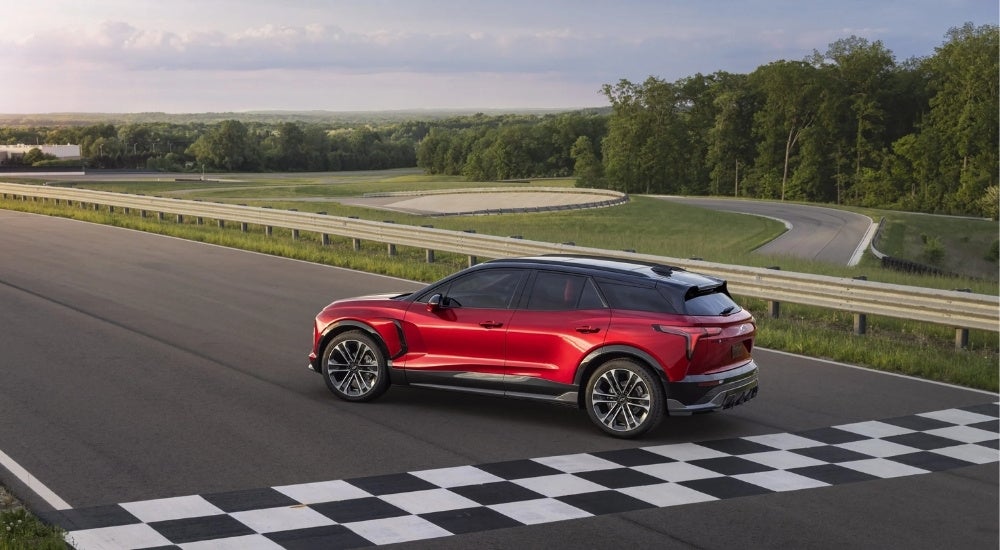 Red 2025 Chevy Blazer EV parked on a race track