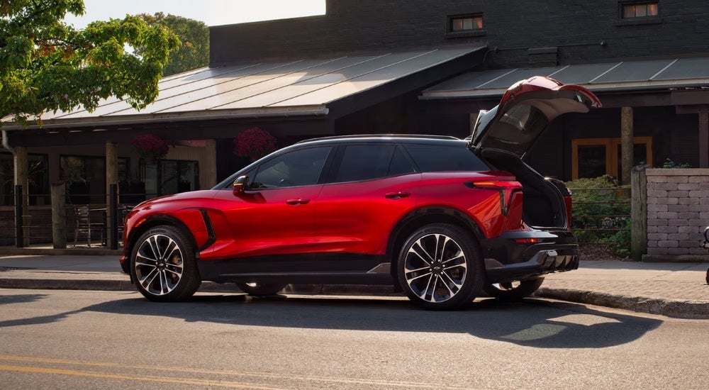 Red 2025 Chevy Blazer EV for sale with an open hatchback