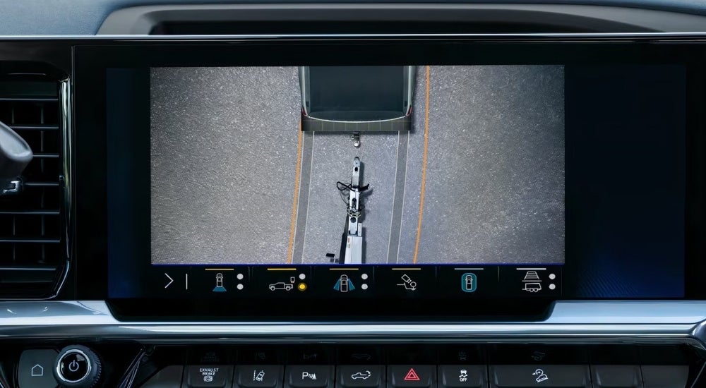 The trailer hitch camera view displayed on the screen of a 2024 Chevy Silverado for sale near Iuka.