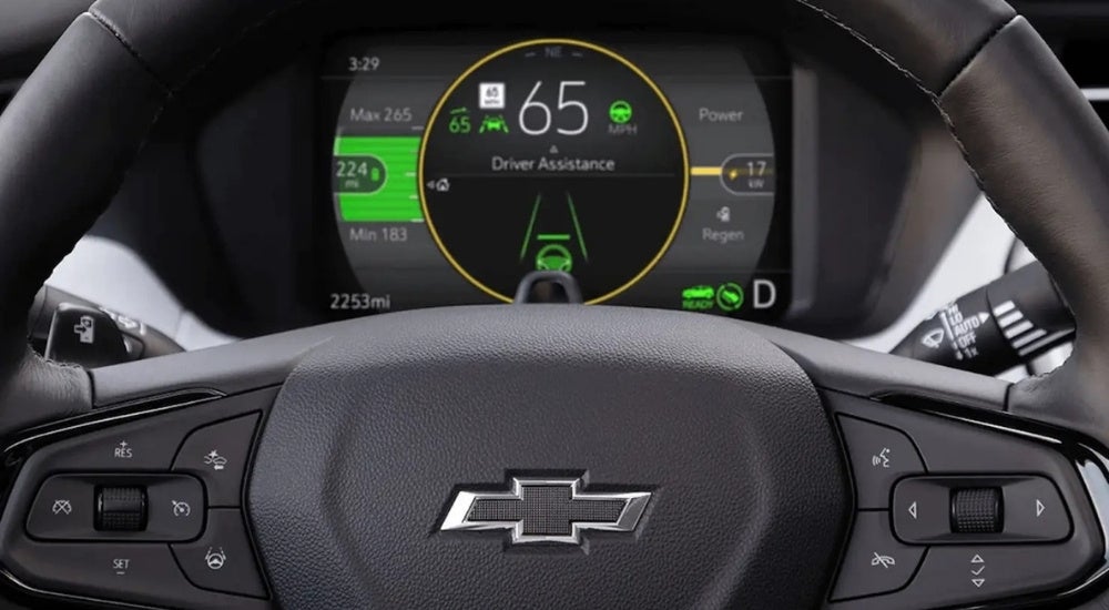 A close-up of the digital gauges and drive assist features in a 2022 Chevy Bolt EUV.