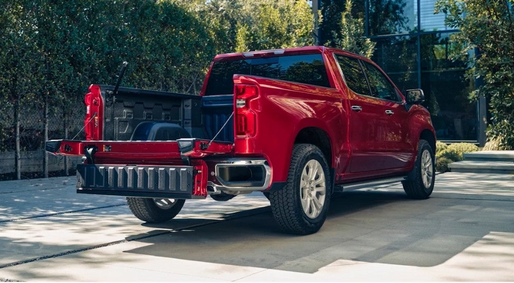 The tailgate on a red 2024 Chevy Silverado 1500 LTZ is shown.