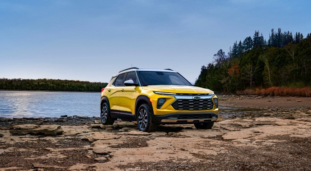 A yellow 2024 Chevy Trailblazer ACTIV is shown from the front at an angle.