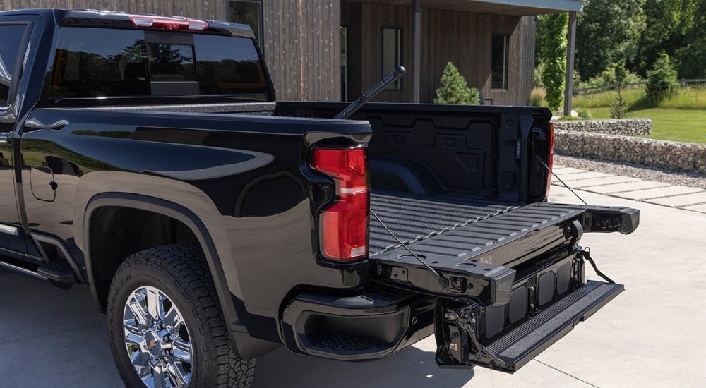 The tailgate is shown on a black 2025 Chevy Silverado 2500 HD.
