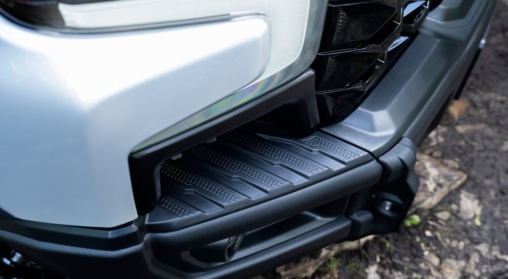 Bumper details are shown on a white 2025 Chevy Silverado 1500 ZR2 Bison.