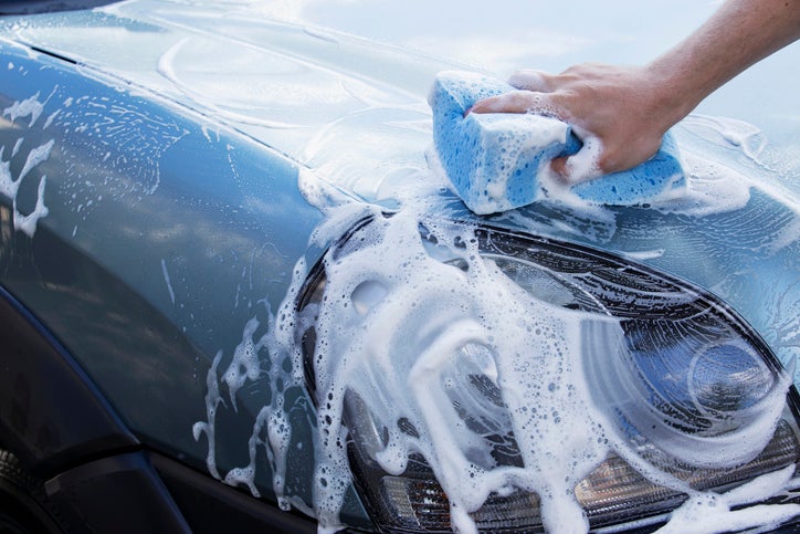 Person washing a car