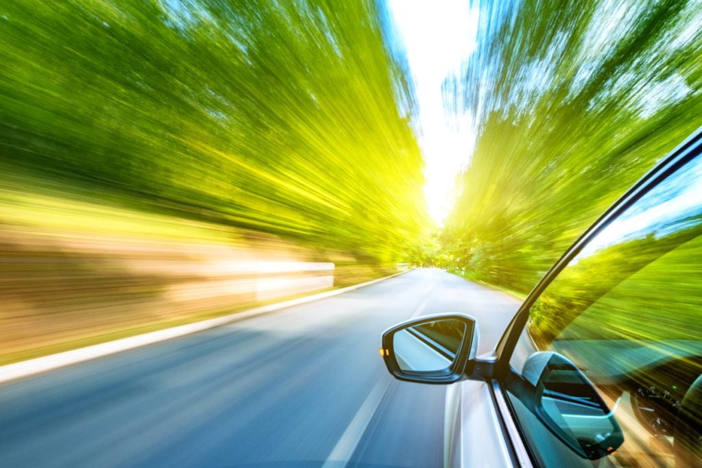 Car driving down the road