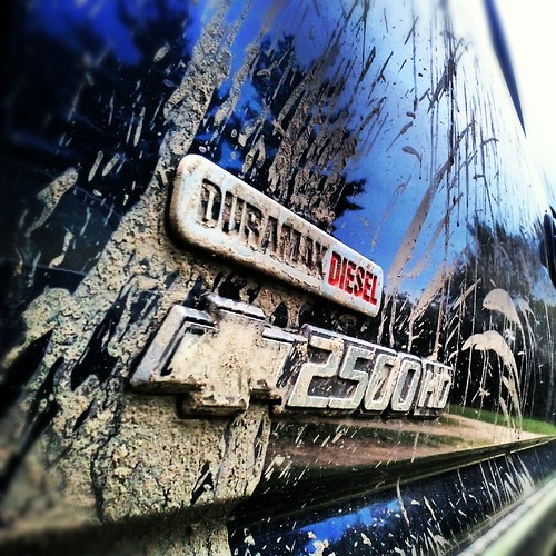 Chevy 2500 Logo with dried mud on it