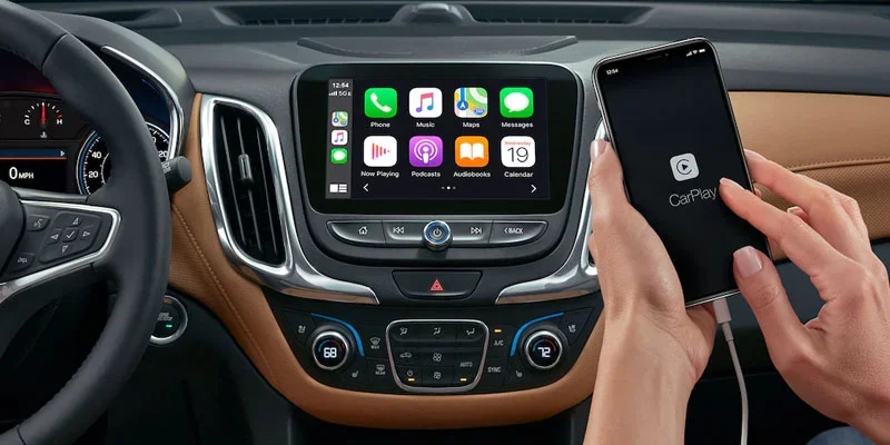 A phone being connected to the infotainment system in a Chevy Equinox