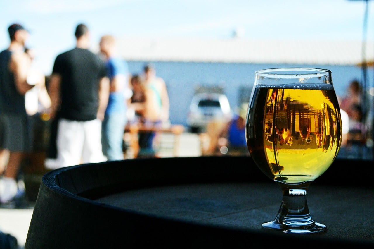 Small glass on a barrel at an event
