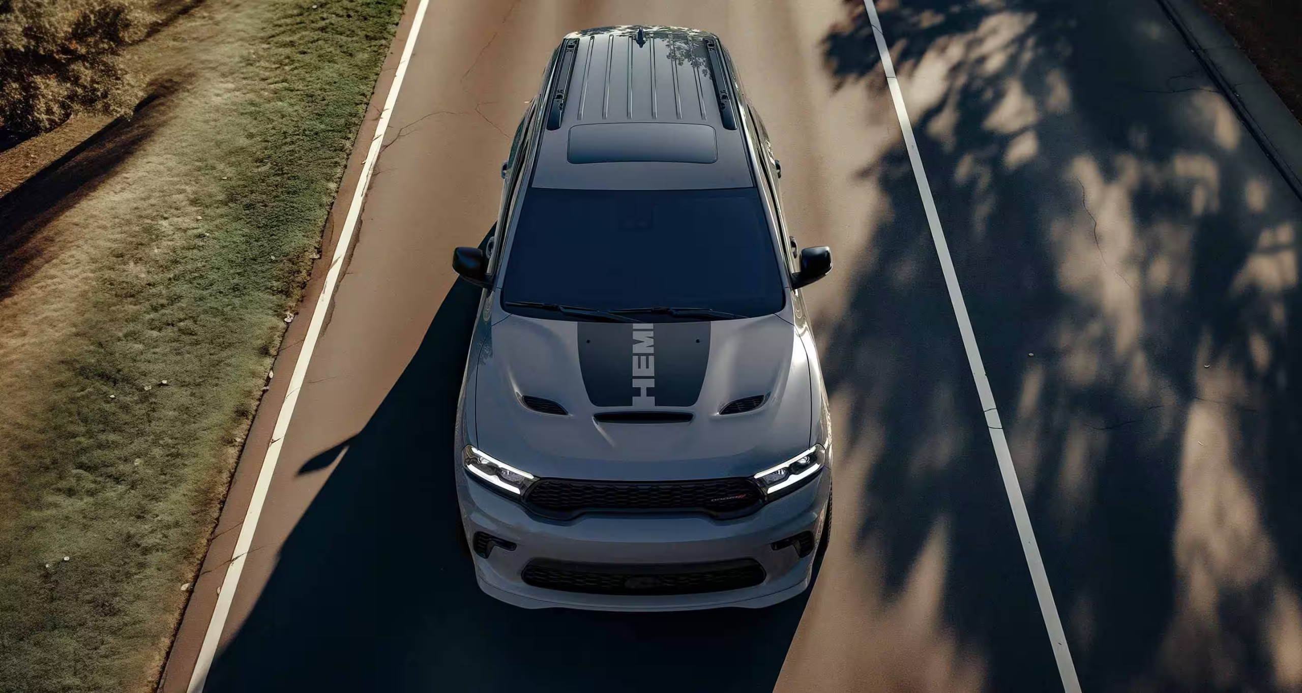 A Dodge lease vehicle on the road