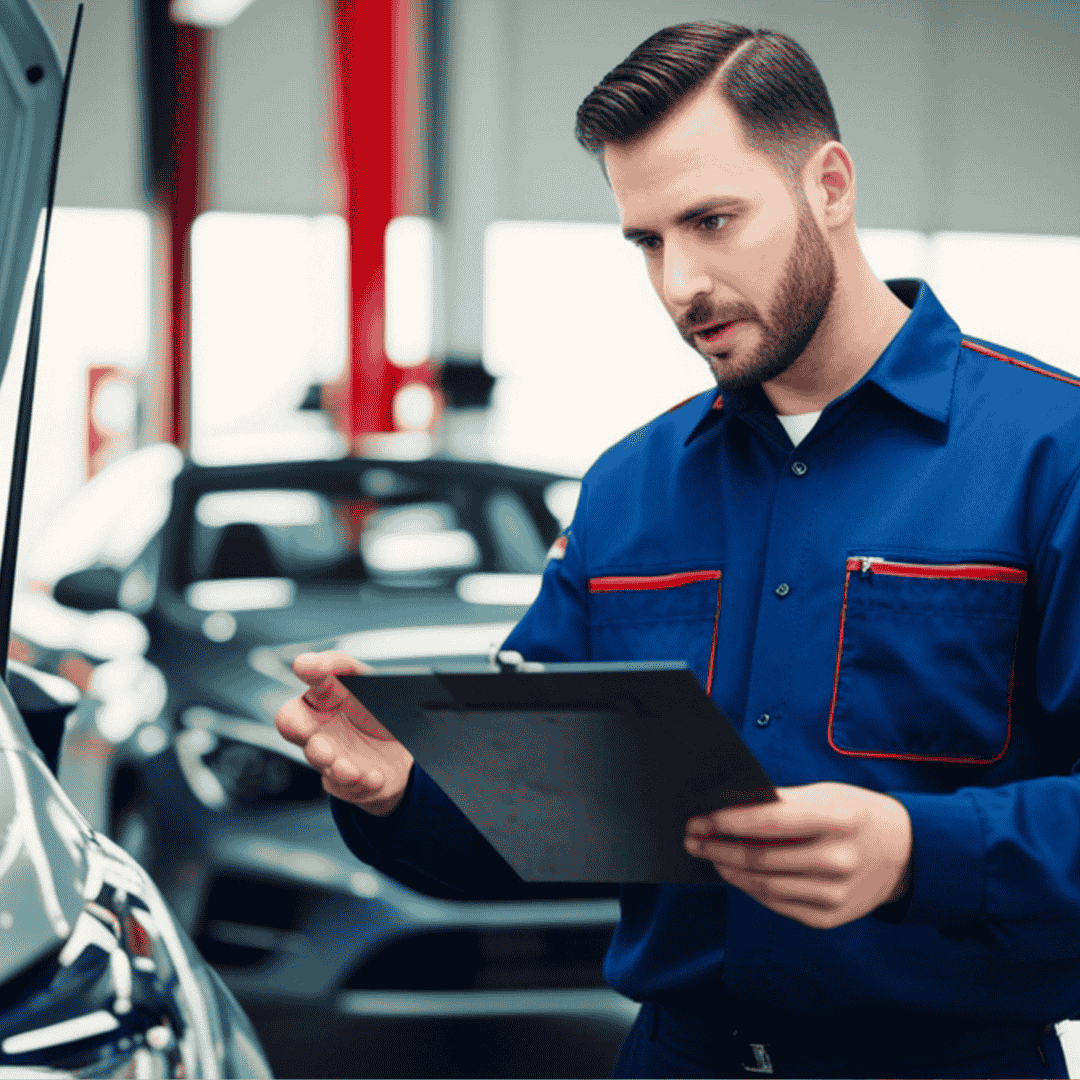 Technician performing a multi-point inspection