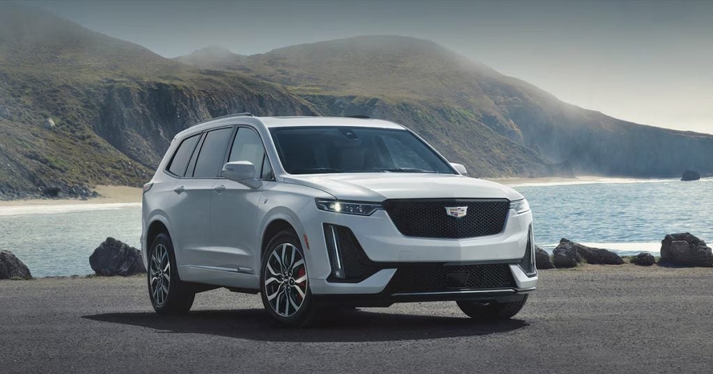 Cadillac XT5 outside near a beach.