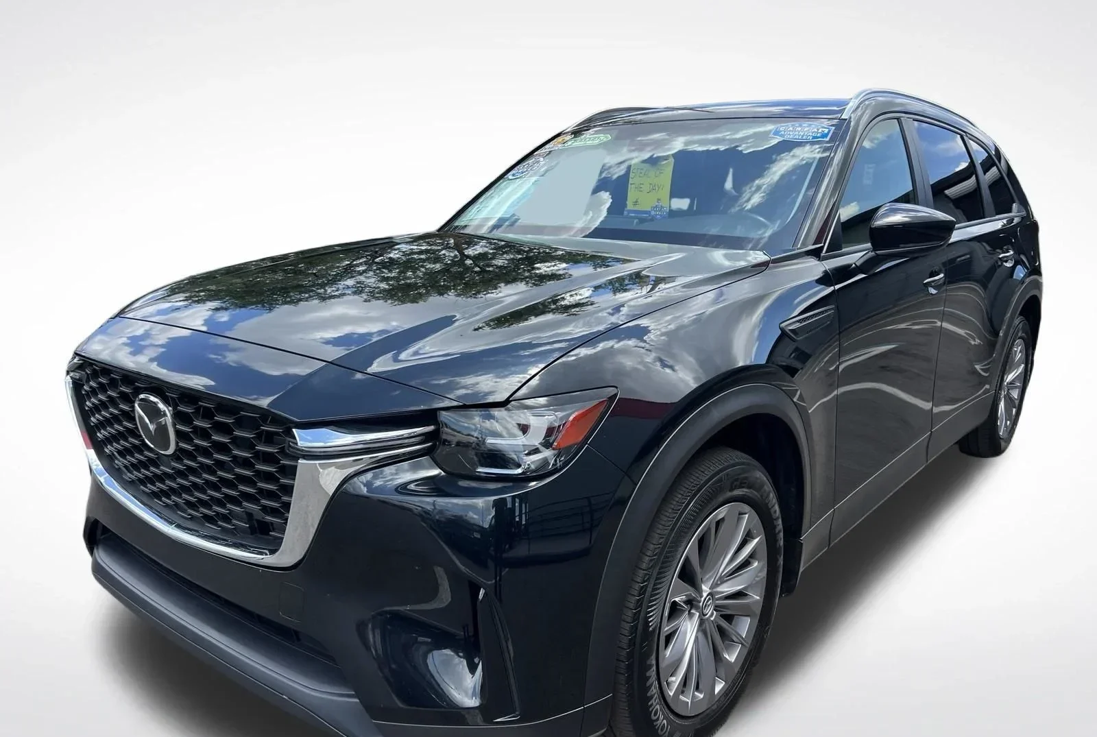 Mazda CX-90 in Orlando at Florida Preowned — three-row SUV with standard AWD, 125-point inspected, 3450 West Colonial Drive