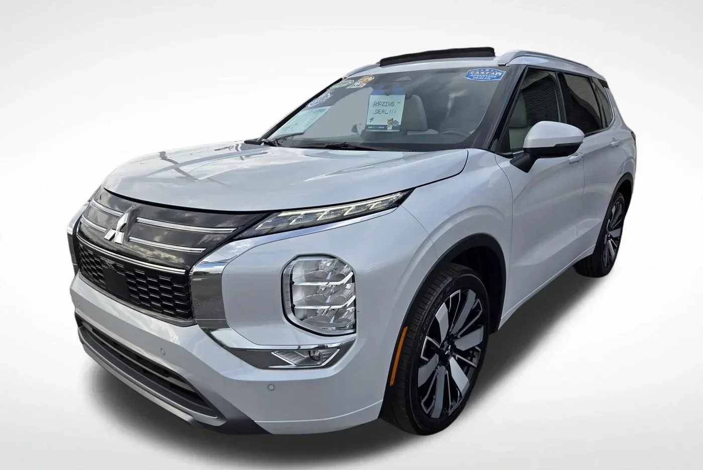 Mitsubishi Outlander in Orlando at Florida Preowned — compact SUV with third-row seating, 125-point inspected, 3450 West Colonial Drive