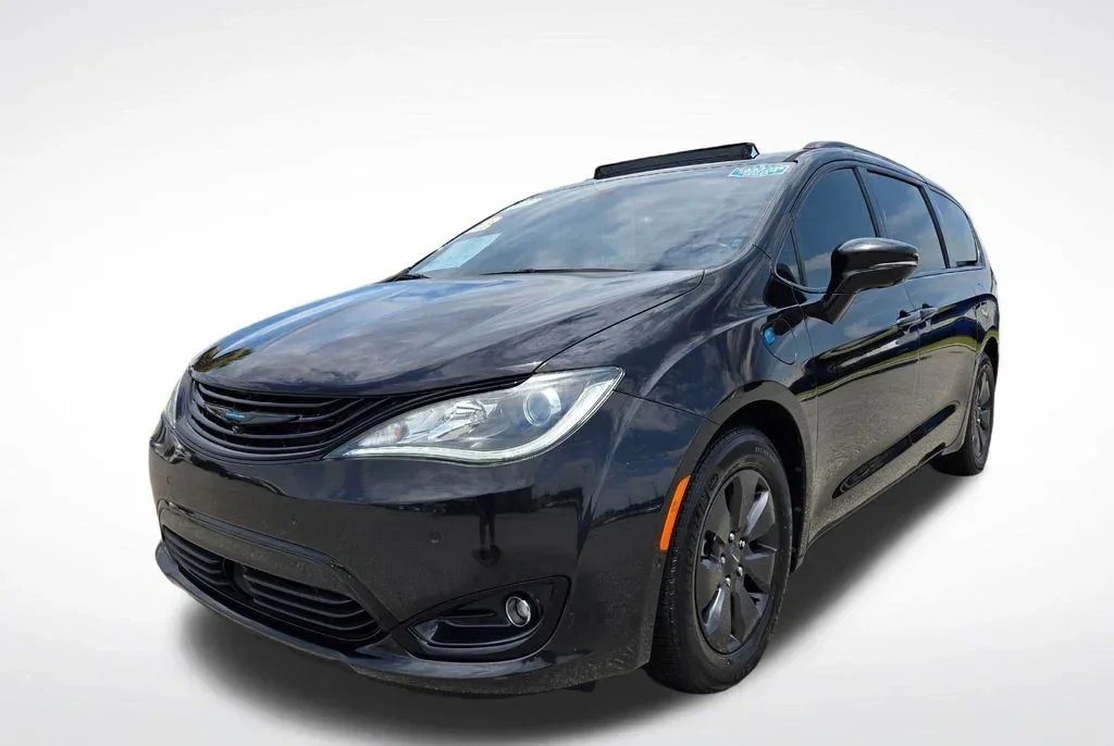 Chrysler Pacifica for sale in Orlando at Florida Preowned — gas and plug-in Hybrid minivans, 125-point inspected, 3450 West Colonial Drive