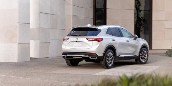 2026 Buick Envision Avenir rear three-quarter and tailgate view