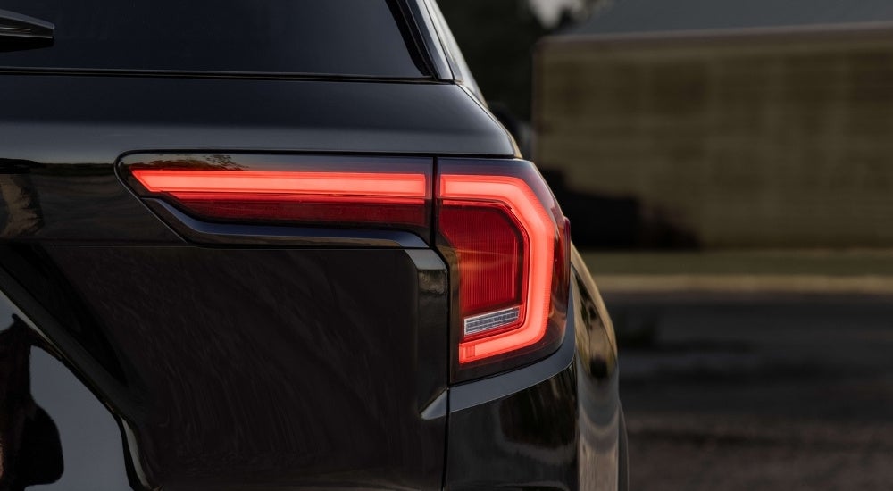 A black 2025 GMC Terrain from the rear.