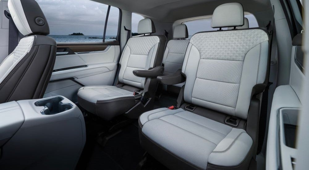 Grey interior seating of a 2025 GMC Acadia Denali.