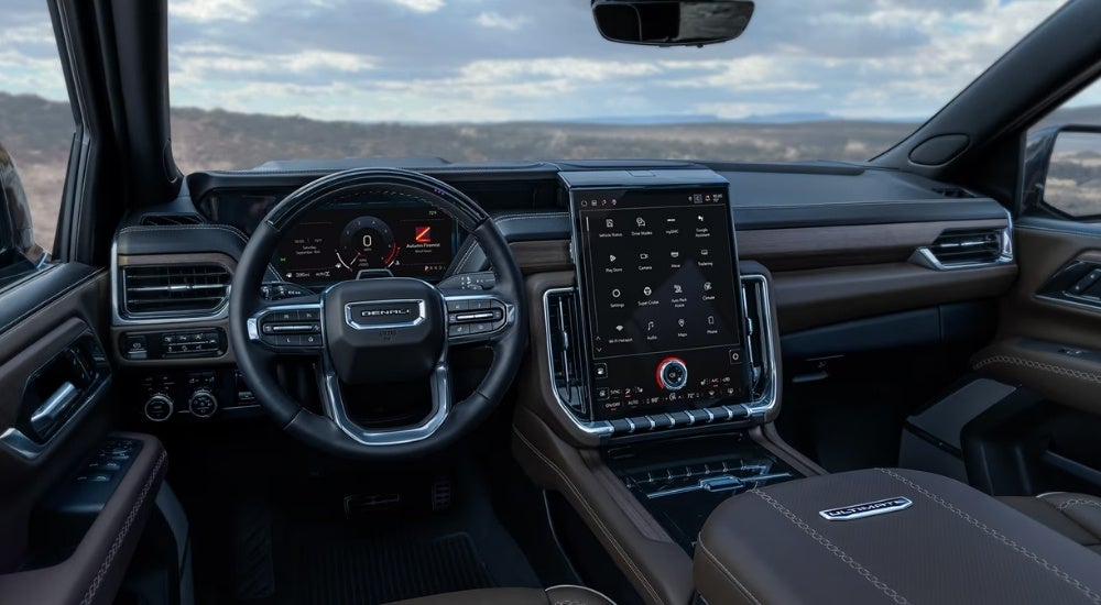 Infotainment display and digital gauge cluster in a 2025 GMC Yukon for sale in Corinth