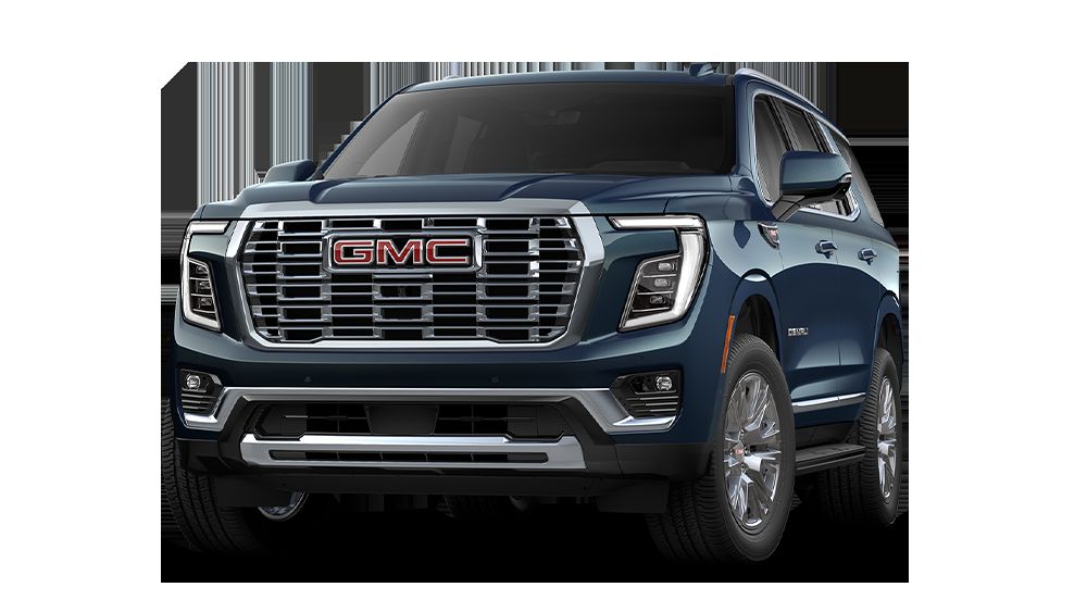 2026 GMC Yukon Denali in Downpour Metallic, three-quarter front view with chrome grille