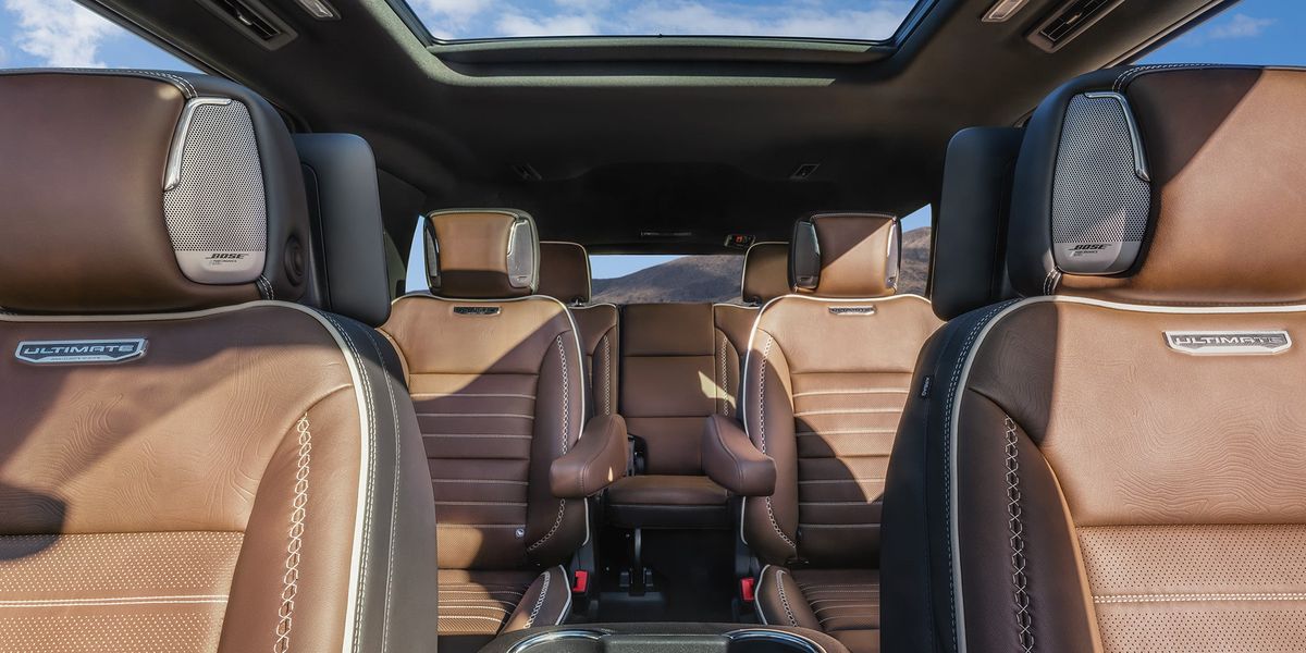 2026 GMC Yukon Denali Ultimate second-row captain's chairs in brown leather with panoramic sunroof
