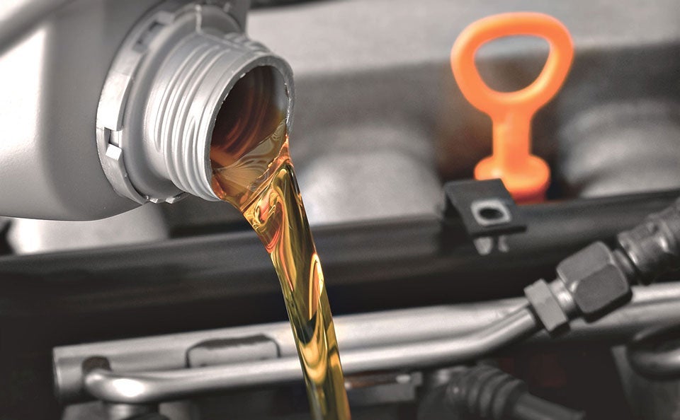 Oil change service being performed