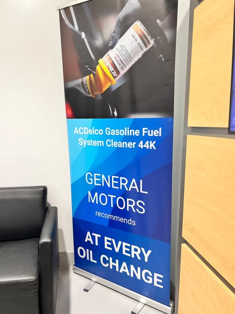 ACDelco Gasoline Fuel System Cleaner 44K poster, highlighting General Motors' recommended oil change product