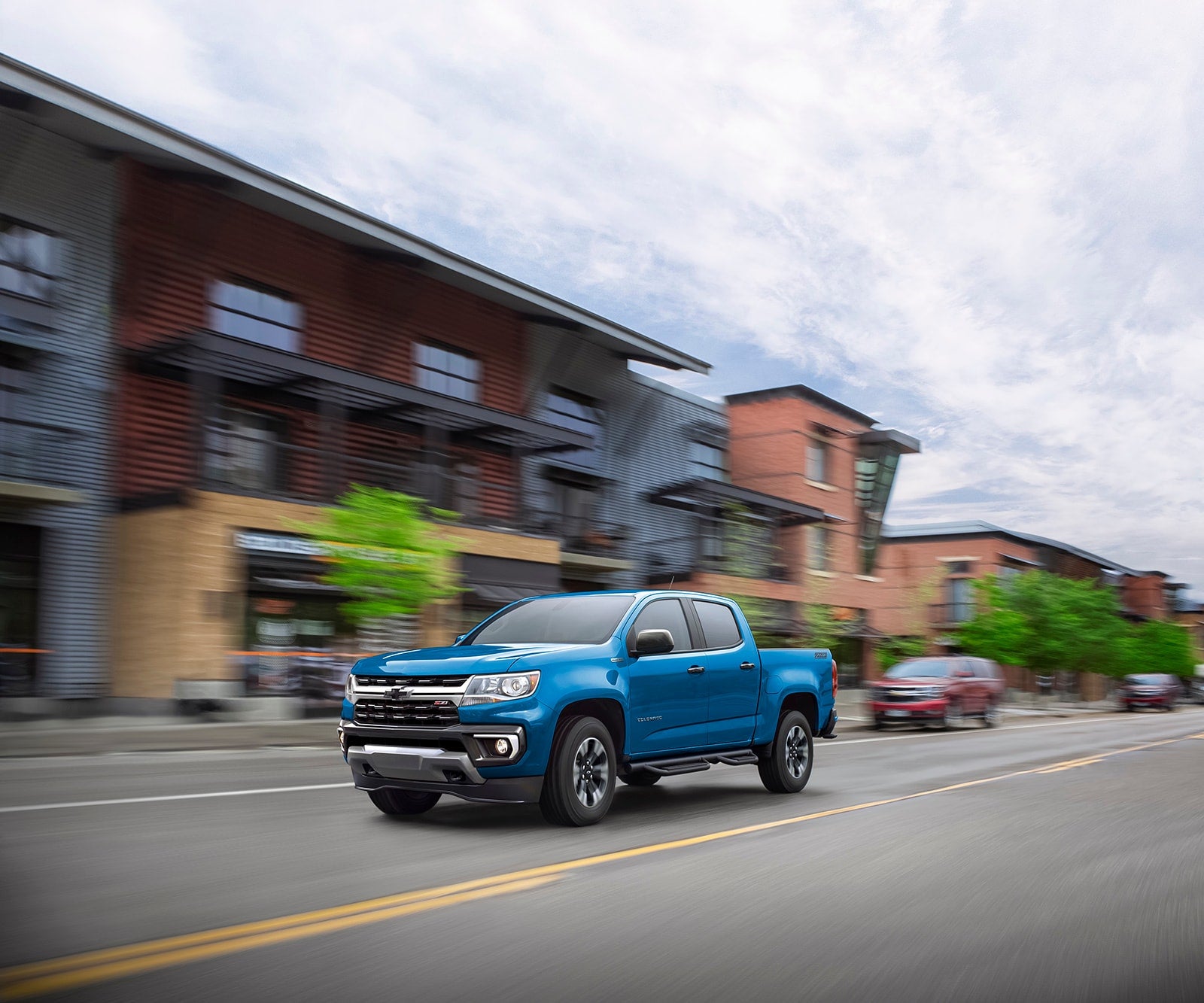 Chevy Colorado driving on road.