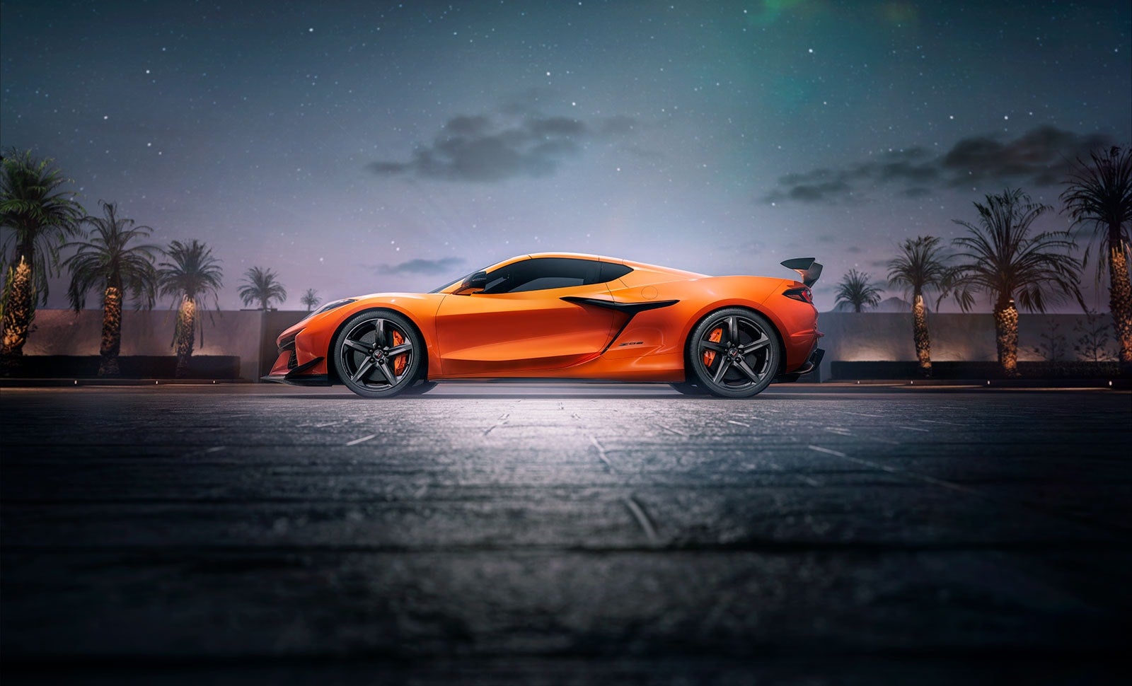 Corvette parked outside at night with palm trees and a starry sky.
