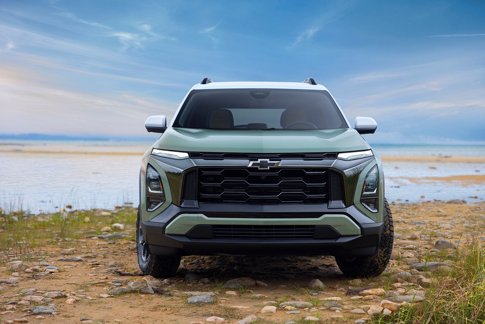 Front view of Chevy equinox on sandy beach.
