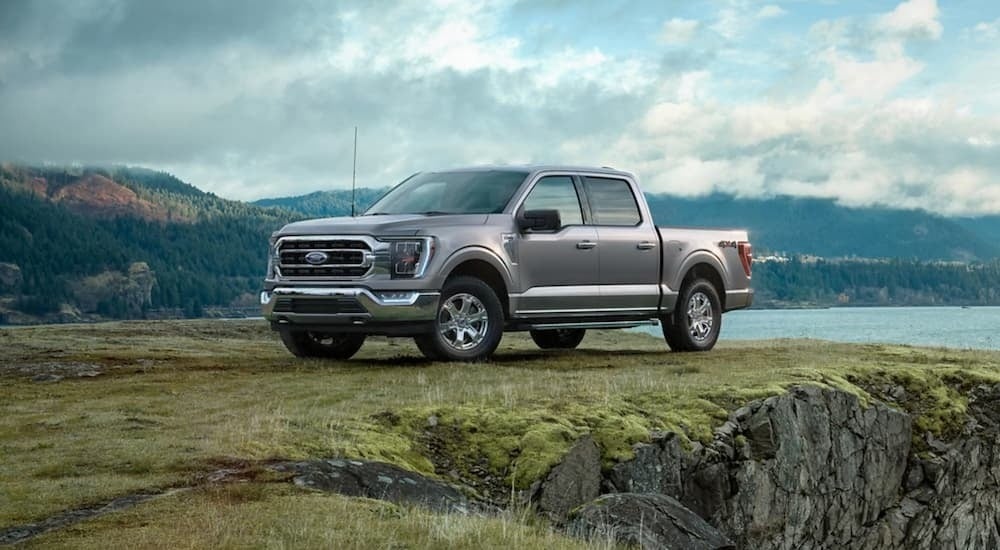 Silver used 2021 Ford F-150 for sale parked off-road.