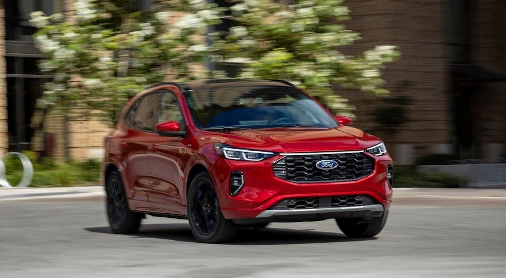 A red 2025 Ford Escape ST is shown from the front at an angle